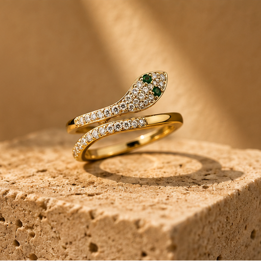 Gold snake ring adjustable serpent wrap with emerald CZ eyes JeevaFashions
