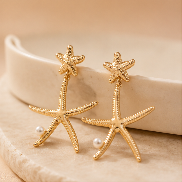 Gold starfish faux pearl earrings styled for beach outing – vacation jewellery for women by JeevaFashions