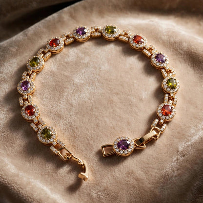 multicolor oval CZ tennis bracelet worn on wrist gold-plated steel for women JeevaFashions