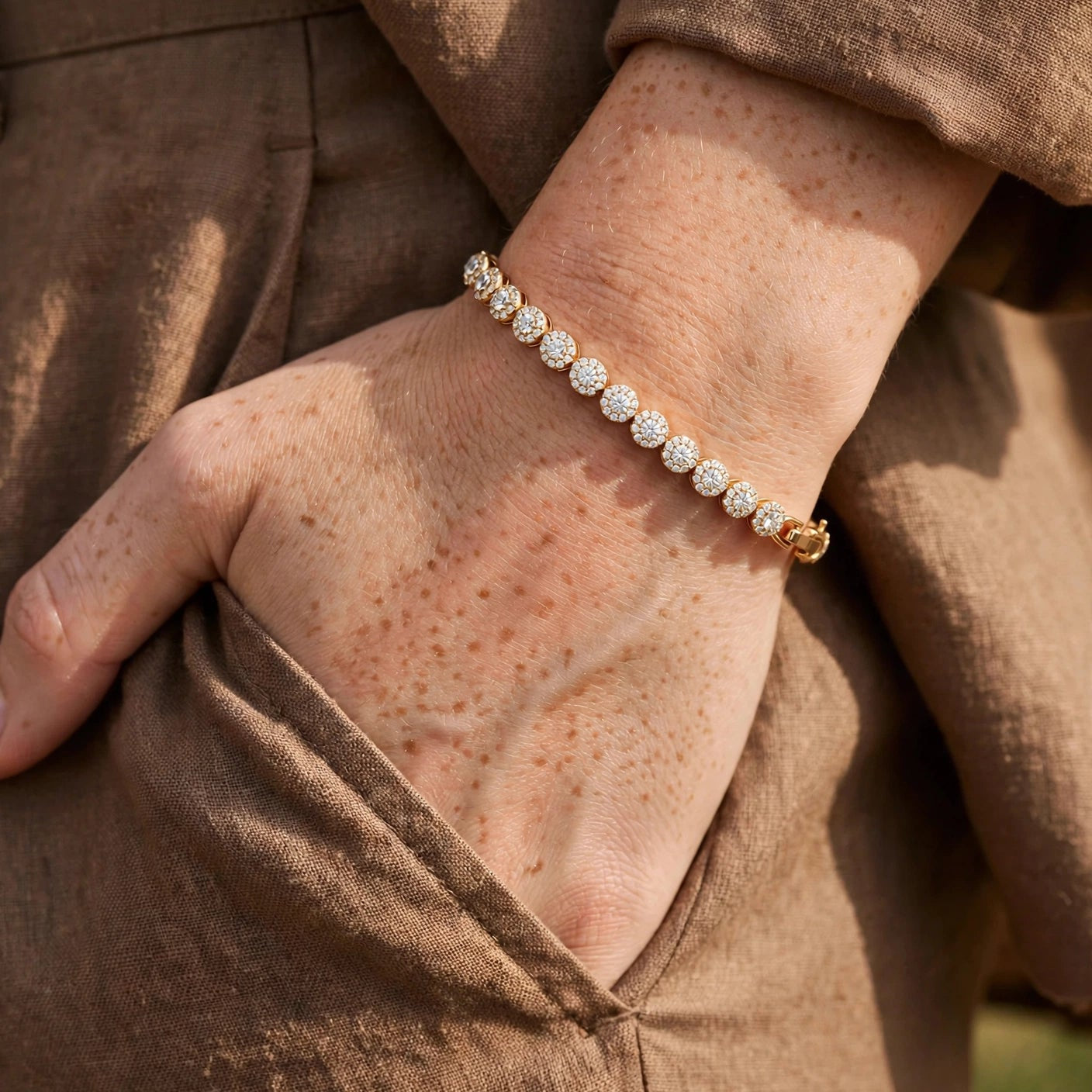 white CZ halo tennis bracelet worn on wrist gold-plated steel for women JeevaFashions