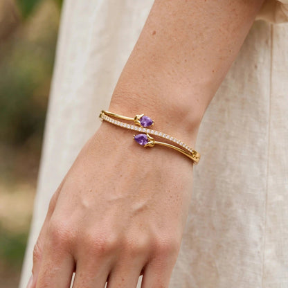 Gold tulip kada bracelet styled on wrist for women at JeevaFashions