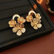 Golden bloom hammered texture floral stud earrings JeevaFashions