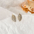 Golden glister pave leaf stud earrings for women JeevaFashions
