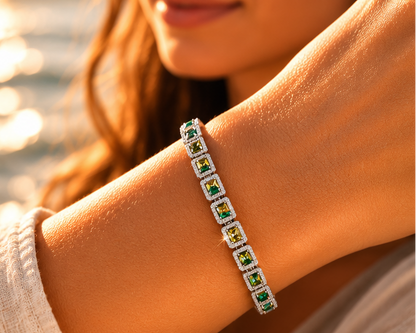 Green and yellow cubic zirconia tennis bracelet worn on wrist – ideal for Indian weddings and festive occasions