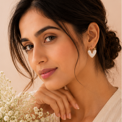 Pearl heart huggie earrings styled for Indian women – iridescent resin heart hoops for daily wear, office and festive occasions