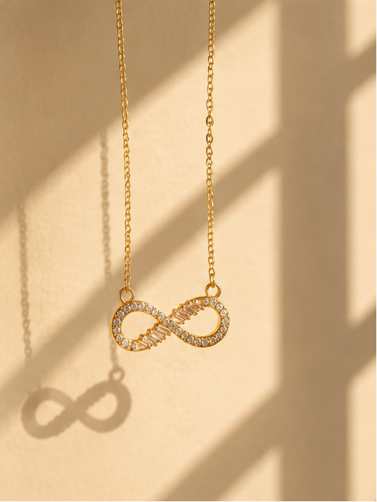 Anti-tarnish gold plated infinity pendant necklace with CZ stones – gifting and daily wear jewellery for Indian women