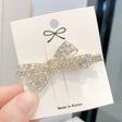 Iridescent crystal bow statement hair clip for women JeevaFashions