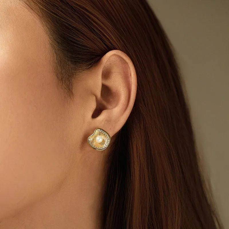 Irregular gold stud earrings styled for women JeevaFashions