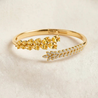 Leaf vine bangle bracelet yellow and clear CZ open cuff for women at JeevaFashions