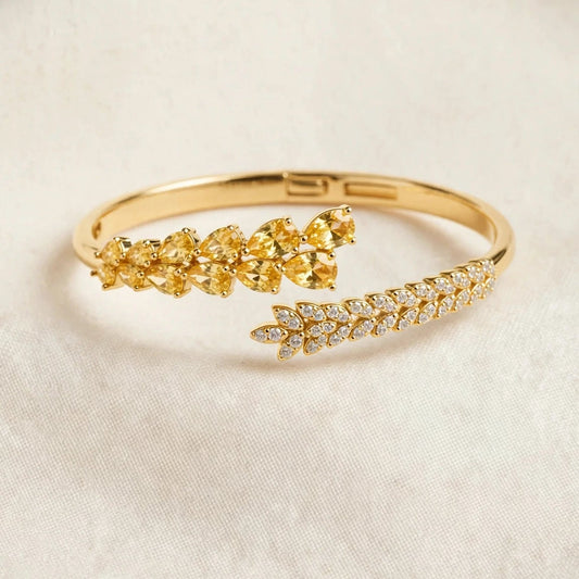 Leaf vine bangle bracelet yellow and clear CZ open cuff for women at JeevaFashions