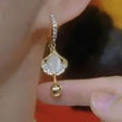 Moonlit opaline teardrop huggie earrings for women JeevaFashions