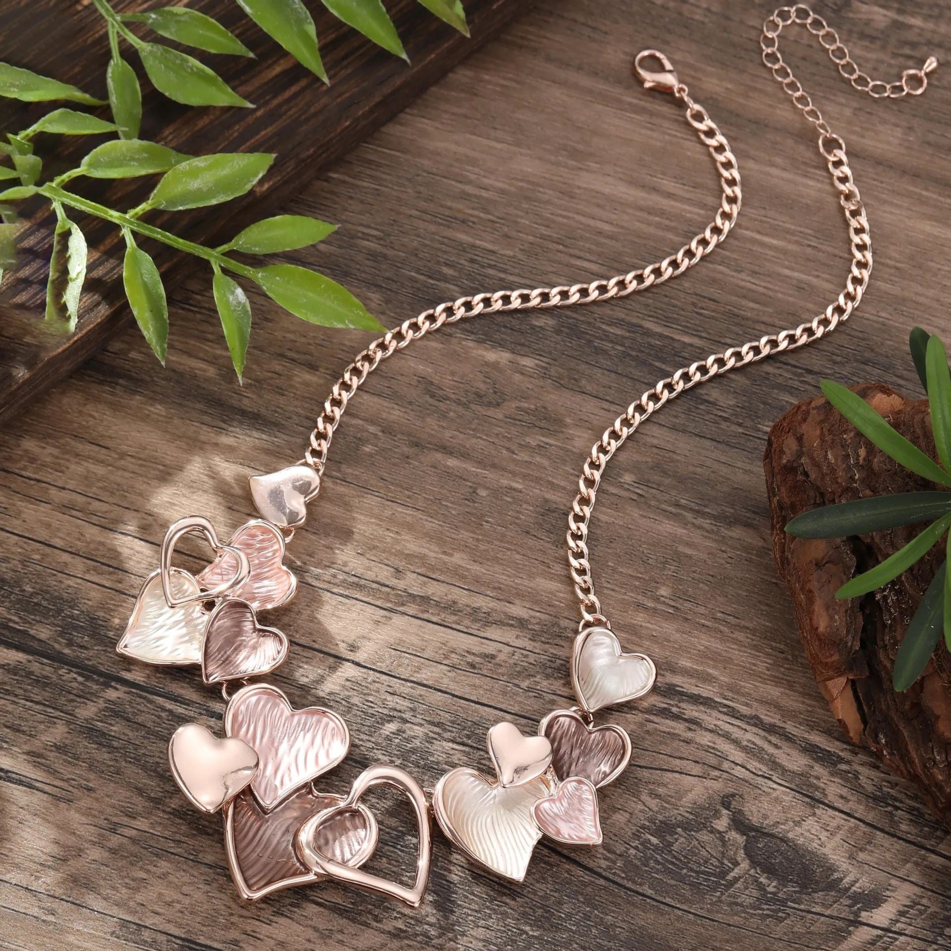 Multi-heart enamel necklace styled on model JeevaFashions