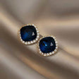 Navy blue CZ stud earrings gold tone halo for women JeevaFashions