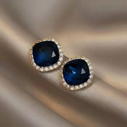 Navy blue CZ stud earrings gold tone halo for women JeevaFashions