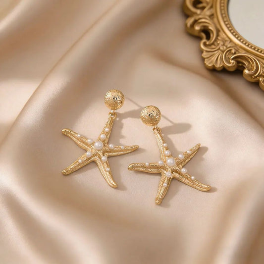 Oceanic radiance starfish pearl drop earrings gold tone JeevaFashions
