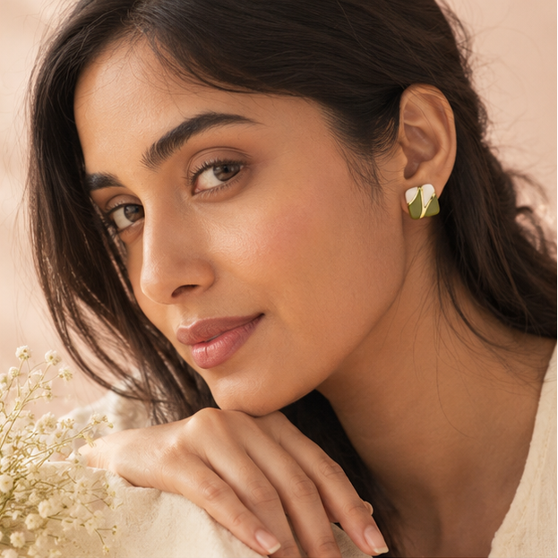 Close-up of olive green and white enamel square stud earrings with polished gold-tone border – JeevaFashions
