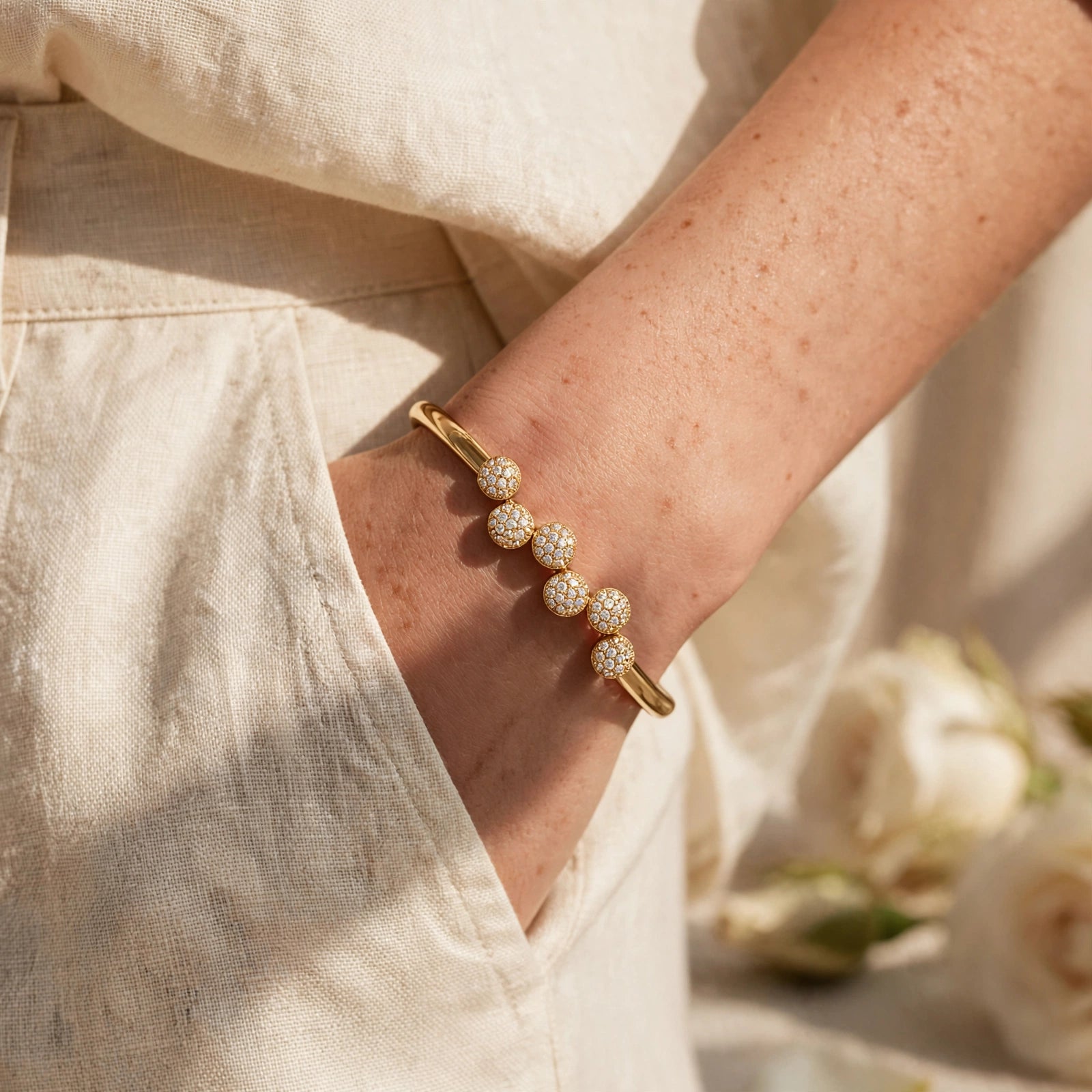 Pavé CZ dome bangle bracelet styled on wrist for women at JeevaFashions