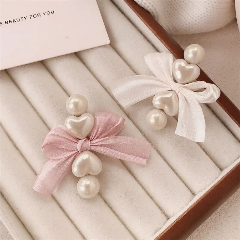 Pearl bow hair clip close up detail JeevaFashions