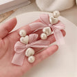 Pearl butterfly knot heart duckbill hair clip for women JeevaFashions