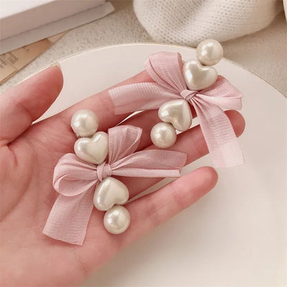 Pearl butterfly knot heart duckbill hair clip for women JeevaFashions