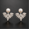 Pearl leaf ear jacket earrings CZ fan silver-tone party wear for women JeevaFashions