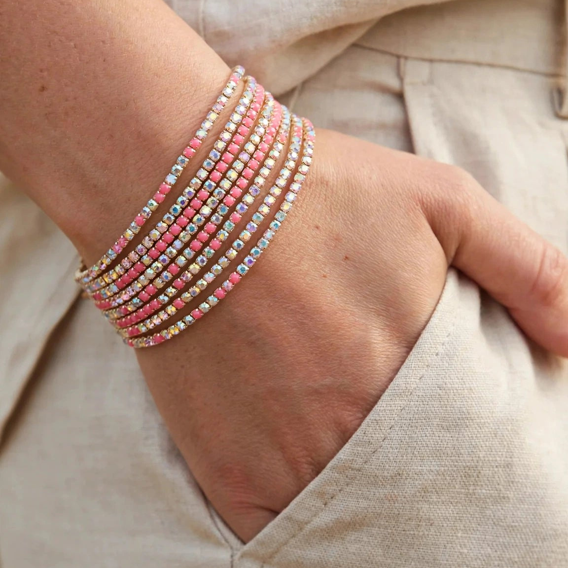 Pink crystal chain bangle on velvet display for women at JeevaFashions