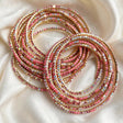 Pink crystal chain bangle in gold-plated alloy for women at JeevaFashions