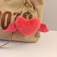 Plush angelic heart wings faux fur bag charm JeevaFashions