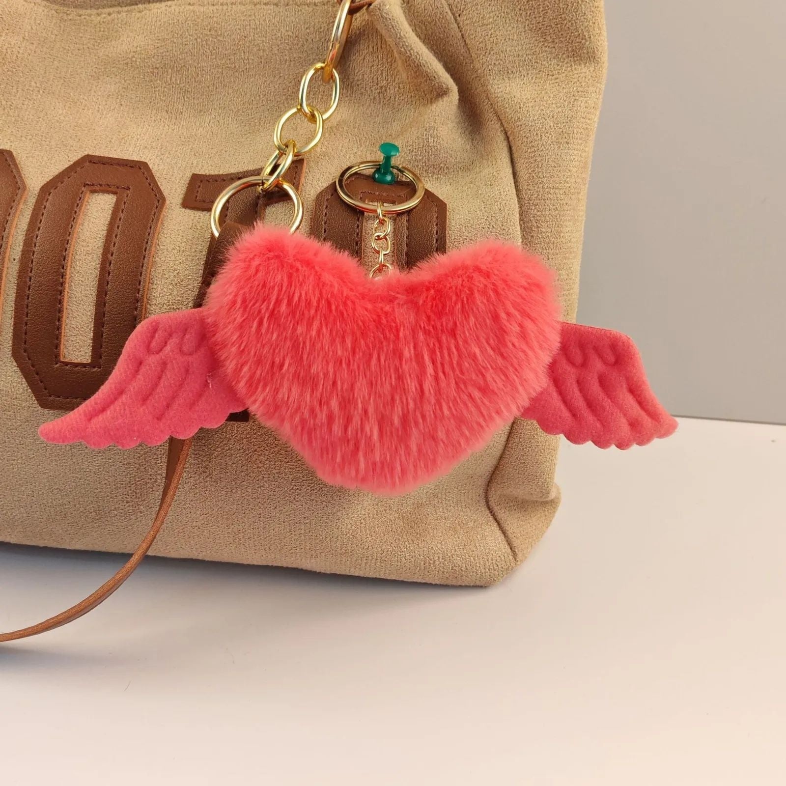 Plush angelic heart wings faux fur bag charm JeevaFashions