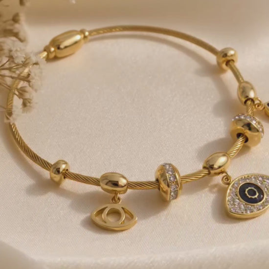 Gold plated evil eye charms bracelet for women – daily wear and festive occasions