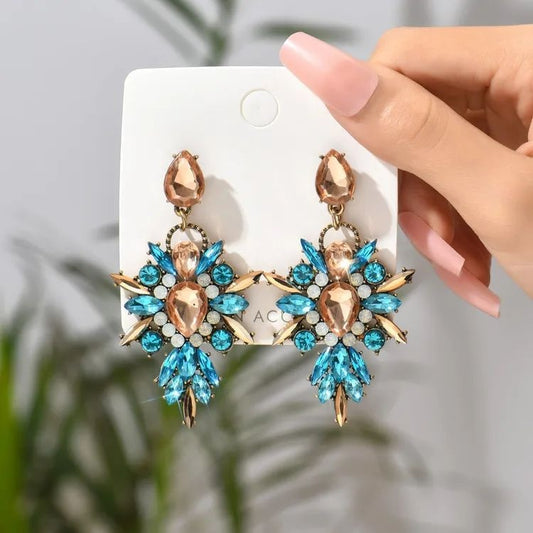 Red crystal floral earrings close up detail JeevaFashions
