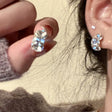 Silver crystal cluster huggie earrings half-hoop party festive wear for women JeevaFashions