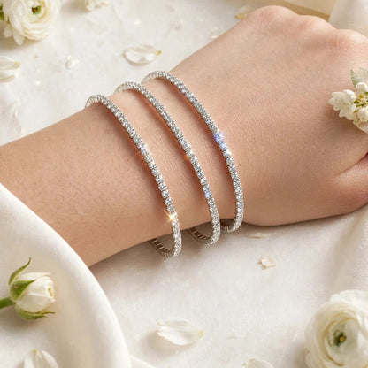 Silver crystal tennis bangle on neutral background for women at JeevaFashions