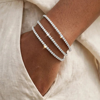 Side angle of silver crystal tennis bangle in 304 stainless steel for women at JeevaFashions