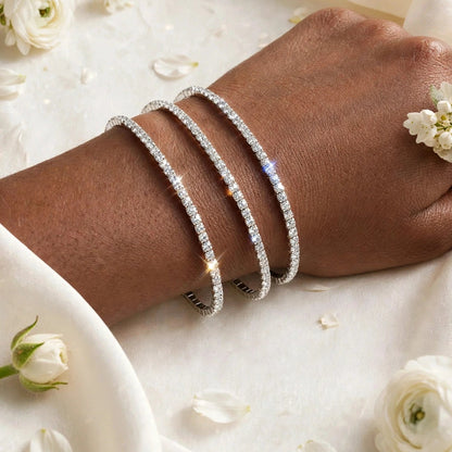 Crystal tennis bangle stacked with other bracelets for women at JeevaFashions