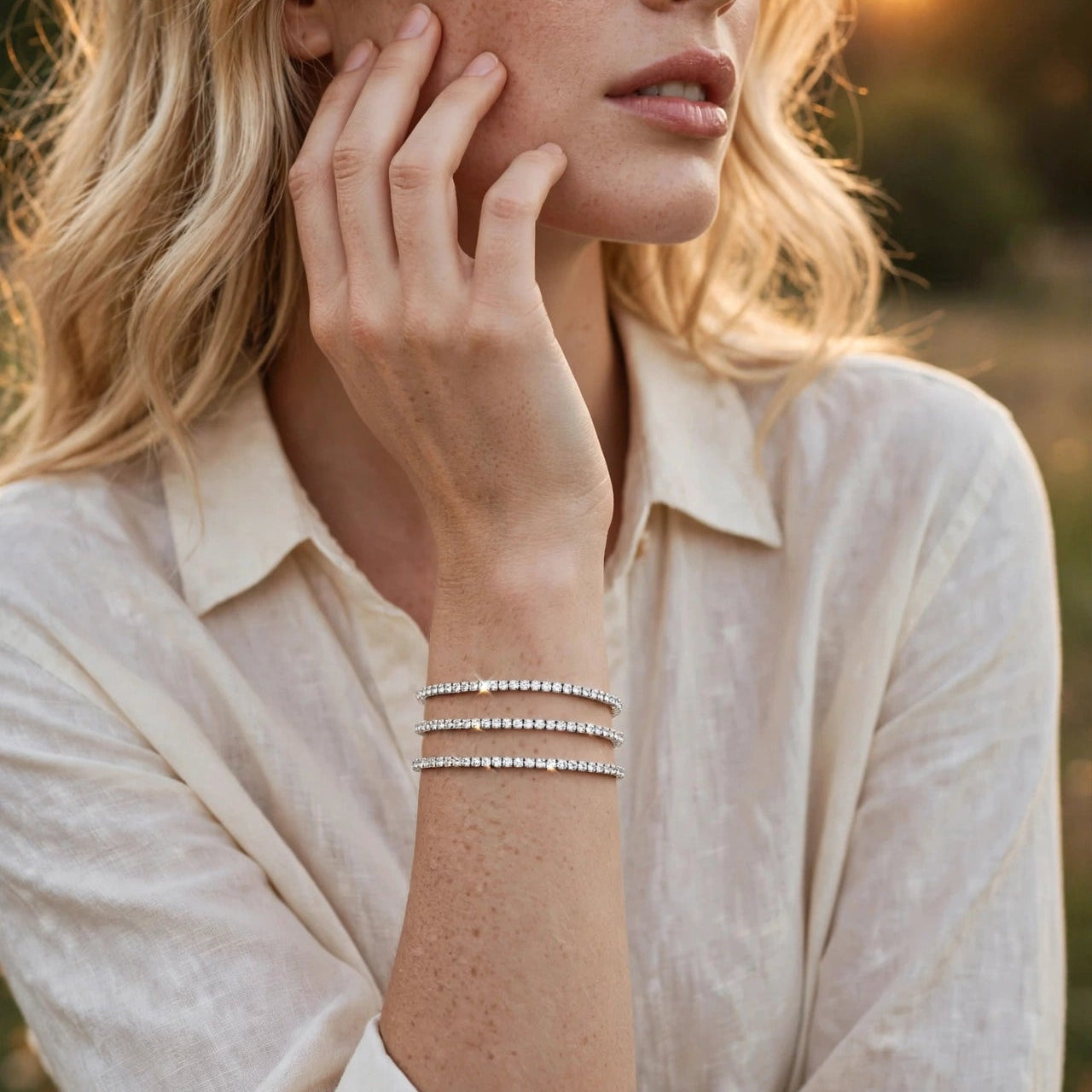 Silver crystal tennis bangle styled on hand for women at JeevaFashions
