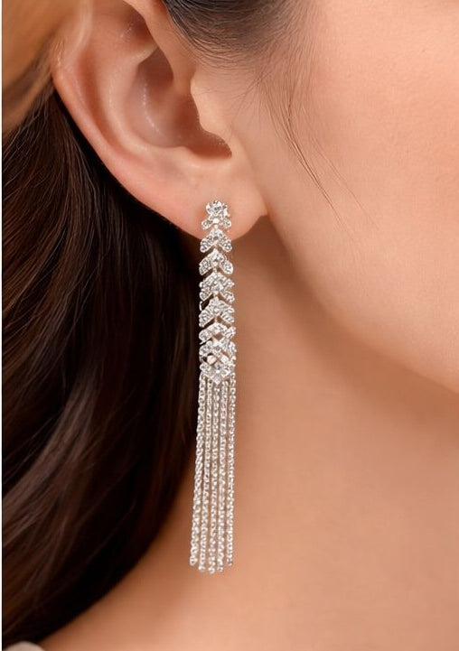 Silver fringe earrings styled for parties JeevaFashions