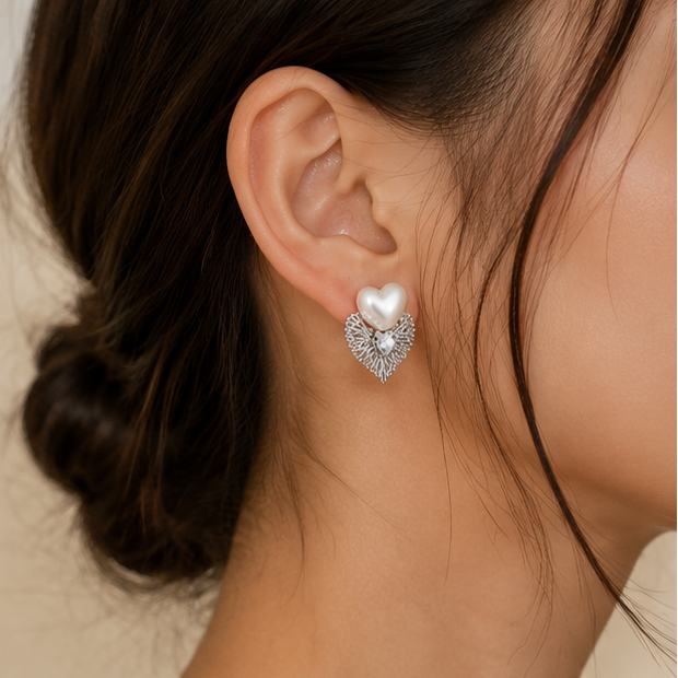 Silver pearl heart earrings styled for festive occasion JeevaFashions