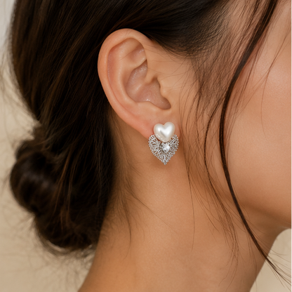 Silver pearl heart earrings styled for festive occasion JeevaFashions