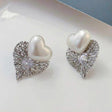 Silver pearl heart stud earrings textured leaf design JeevaFashions