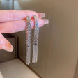 Trendy silver fringe earrings Korean style long dangle JeevaFashions