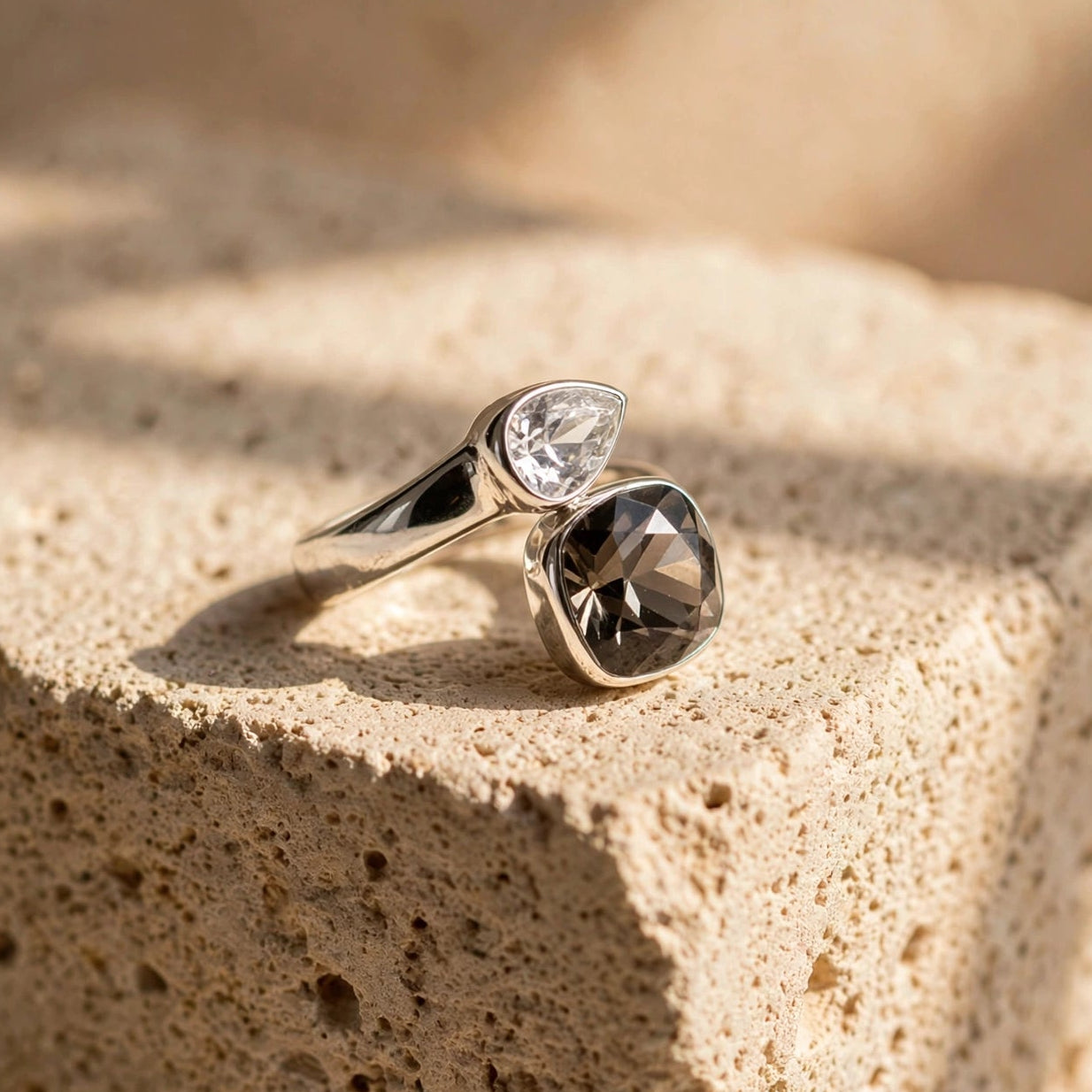 Side angle of two-tone crystal open ring in 316L stainless steel for women at JeevaFashions