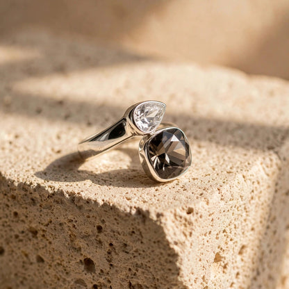 Side angle of two-tone crystal open ring in 316L stainless steel for women at JeevaFashions