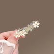 Sparkling crystal cat eye flower gold hair clip JeevaFashions