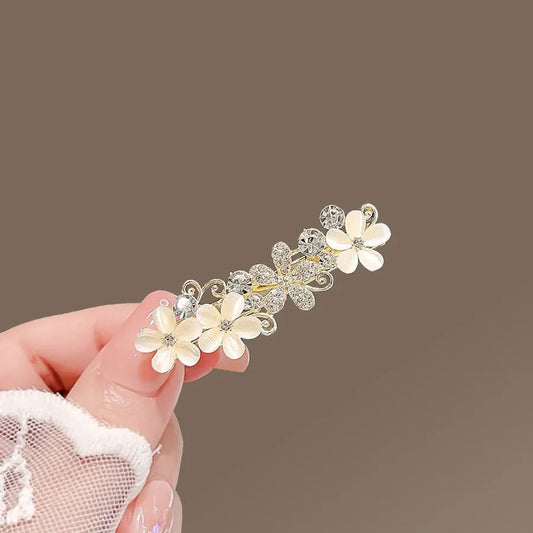 Sparkling crystal cat eye flower gold hair clip JeevaFashions