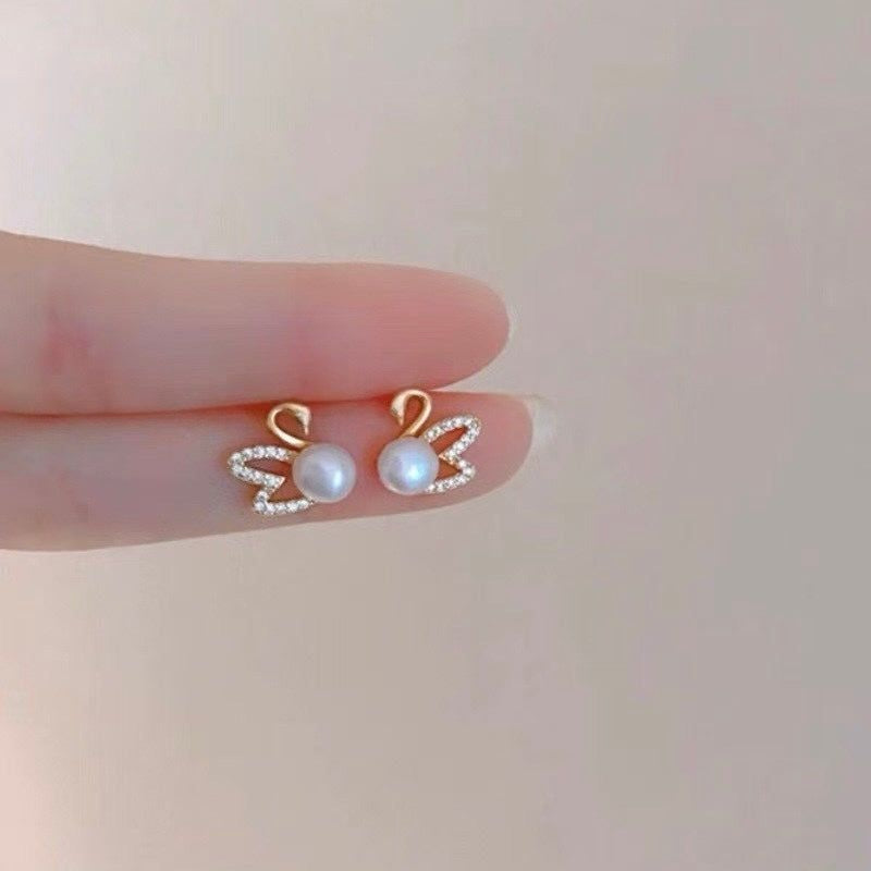 Sparkling crystal swan pearl stud earrings gold plated JeevaFashions