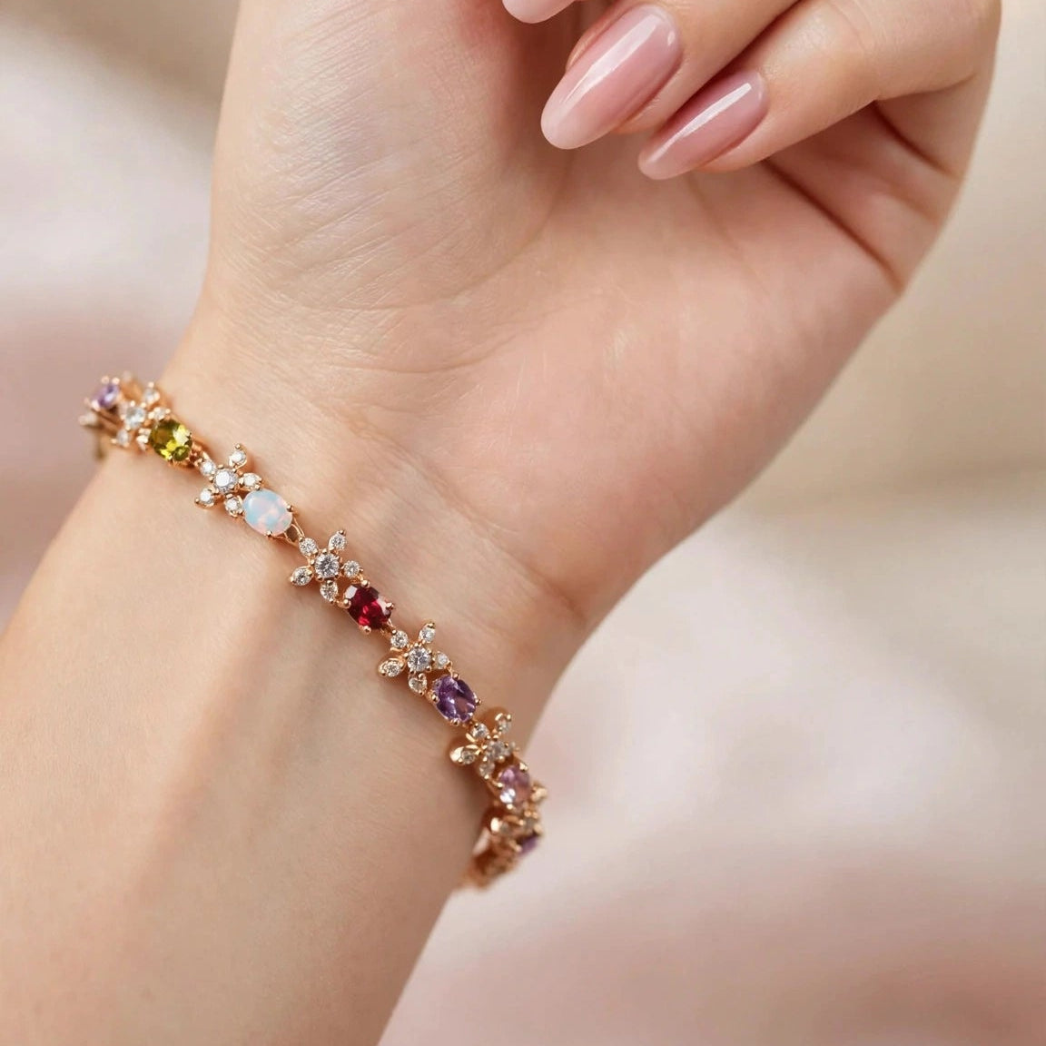 Women's stainless steel gold plated bracelet with oval multicolour cubic zirconia stones