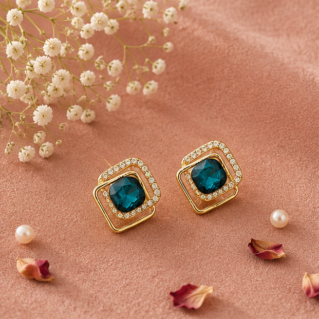 Gold tone teal CZ earrings closeup for women JeevaFashions