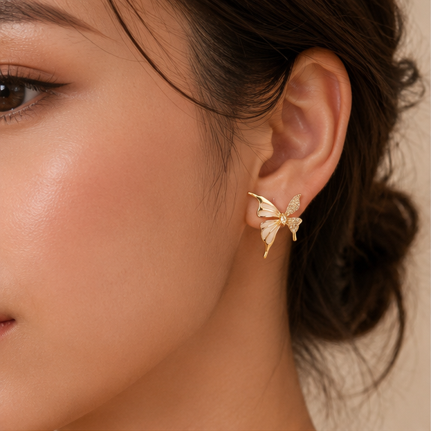 Gold tone two-tone butterfly earrings closeup for women JeevaFashions