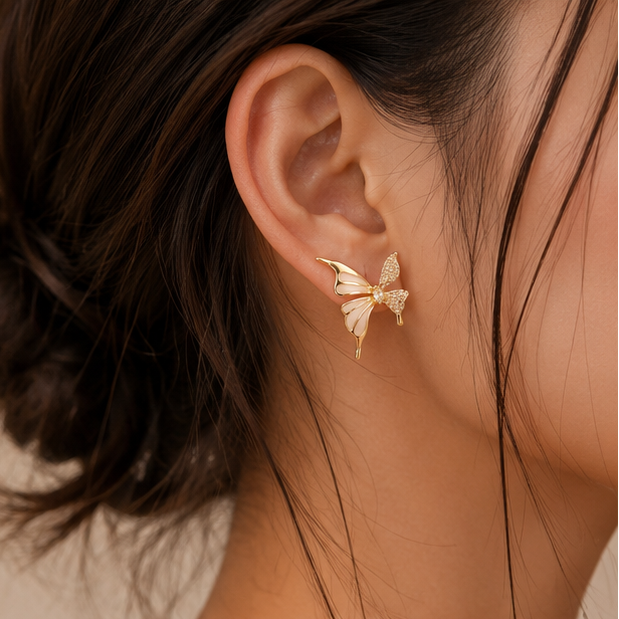 Two-tone butterfly earrings styled for festive occasion JeevaFashions